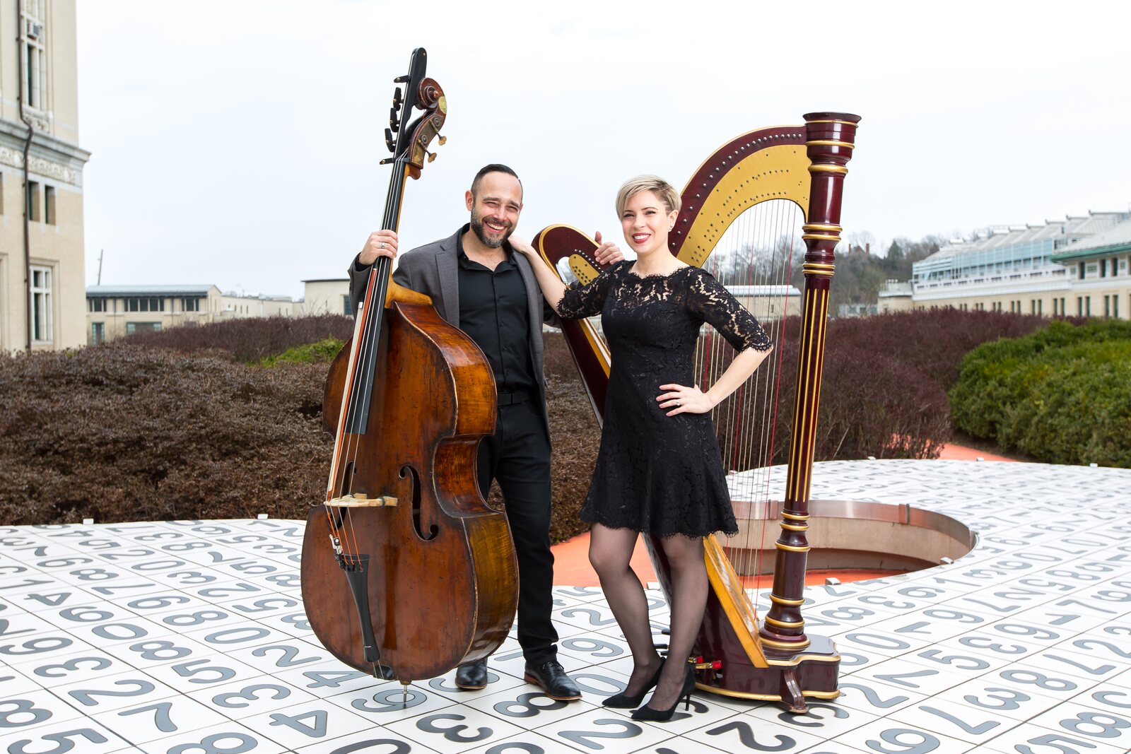 Micah and Rachel Howard with their instruments